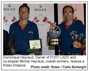 Dominique Heyraud, Owner of FOXY LADY and co-skipper Michel Heyraud, overall winners, receive a Rolex timepice 
, Photo credit: Rolex / Carlo Borlenghi